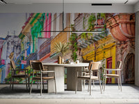 A wall mural of a vibrant Cuban street scene.

