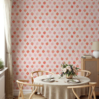 Whimsical strawberry pattern on a wall.

