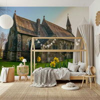 Rustic stone facade paired with Golden Daffodils wall mural for classic decor.