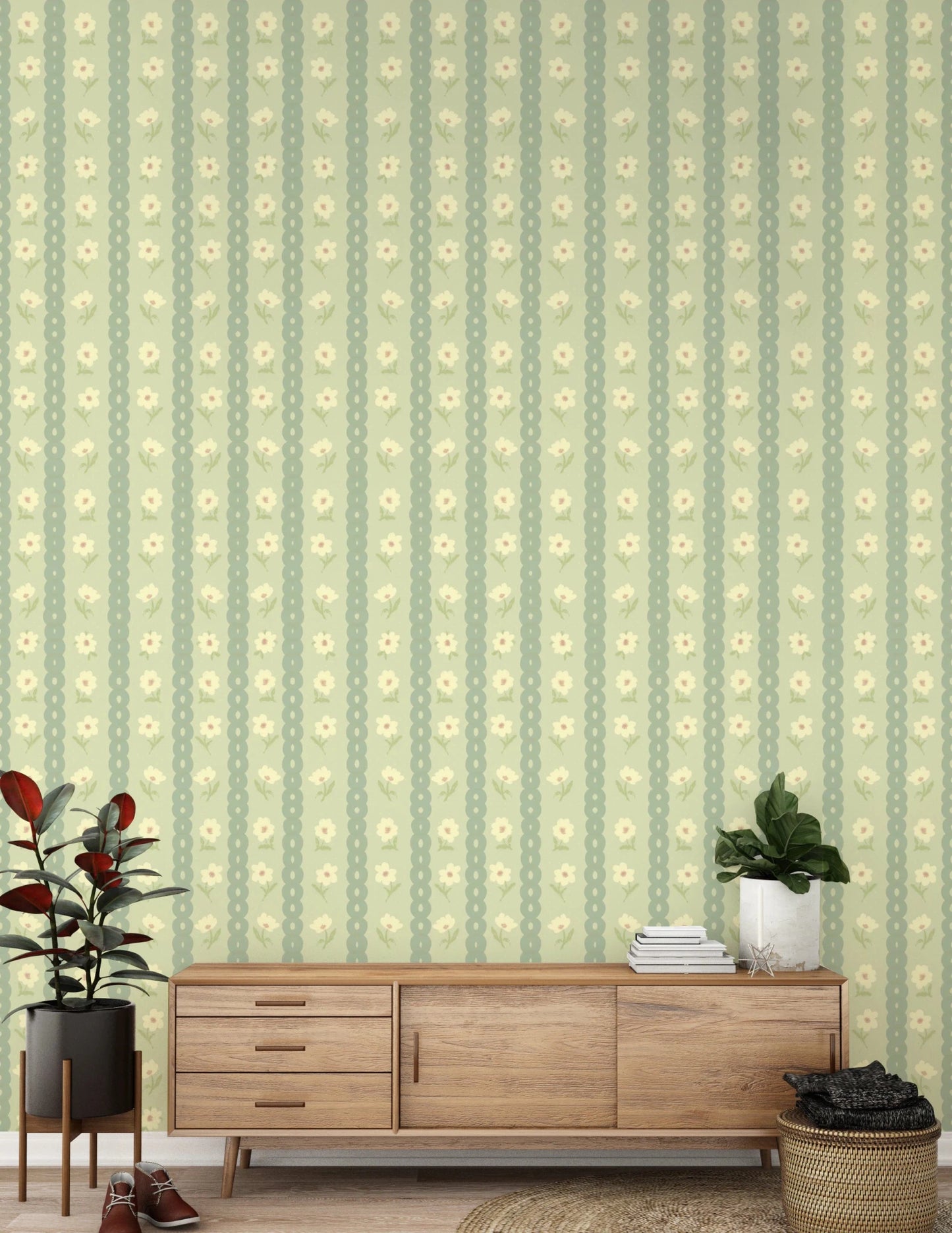Daisy Chain Delight wallpaper mural behind a walnut credenza with a rubber plant and fiddle leaf fig, green daisies