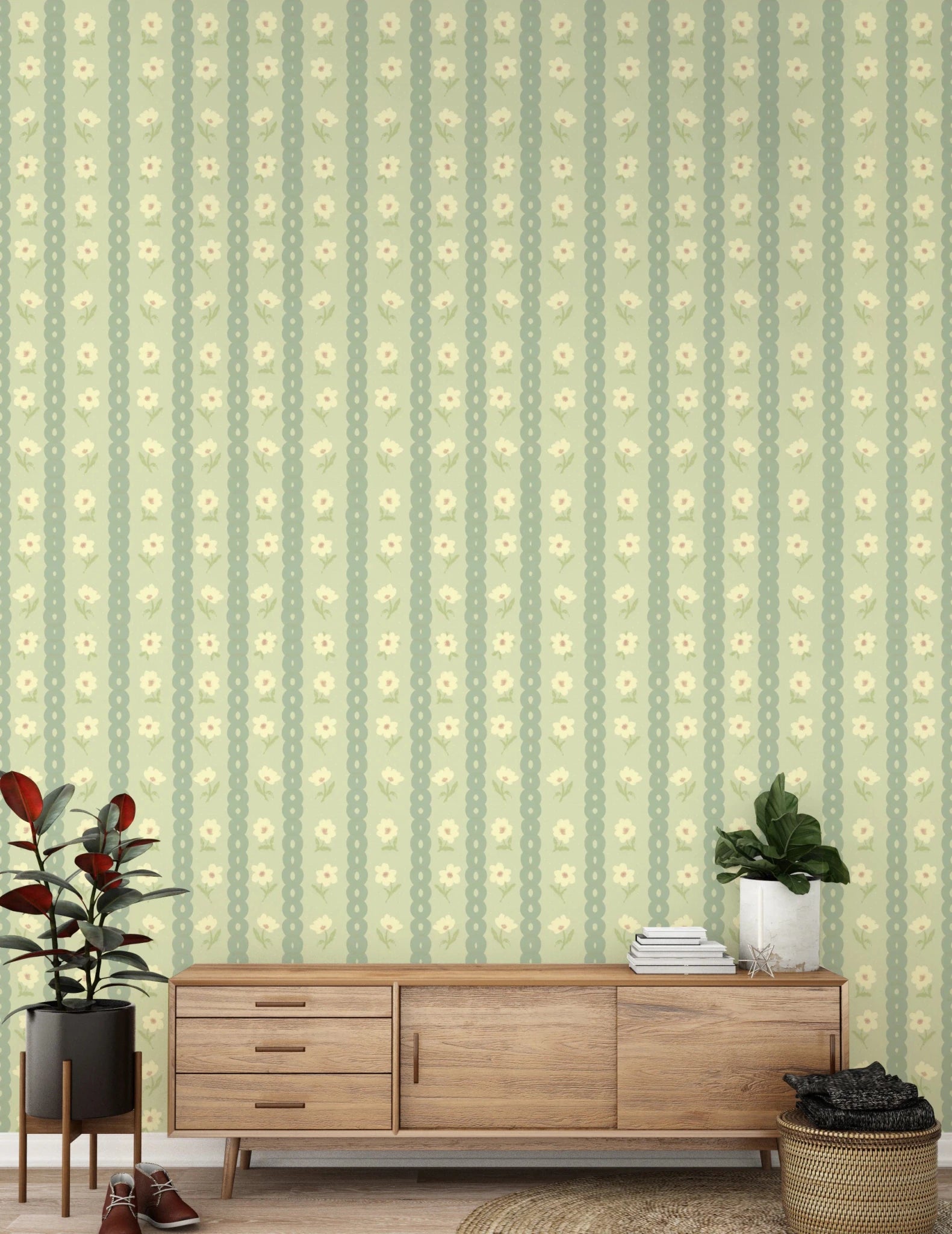 Daisy Chain Delight wallpaper mural behind a walnut credenza with a rubber plant and fiddle leaf fig, green daisies