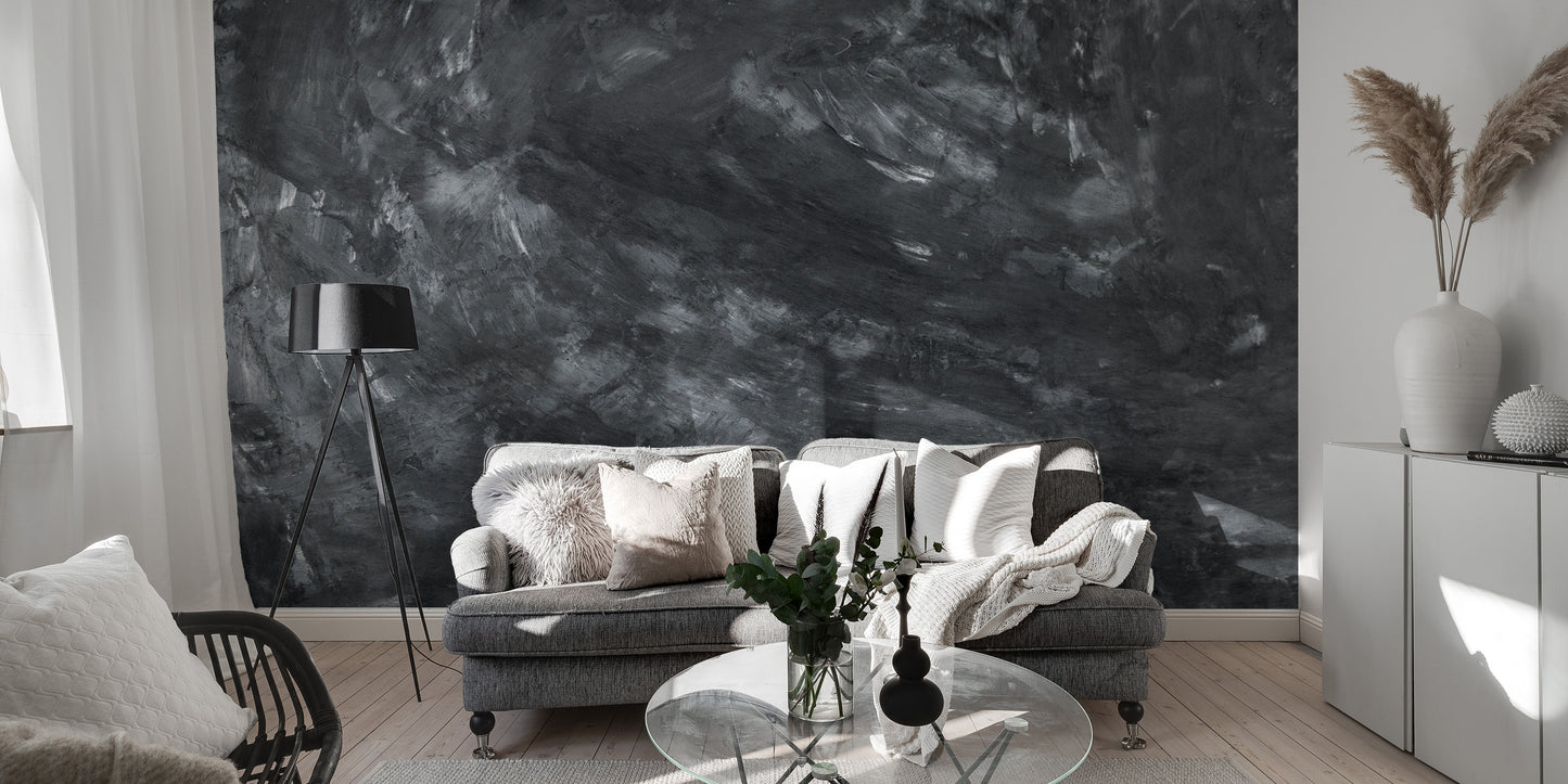 Dark Concrete wallpaper mural styled as a feature wall behind a dining table and chairs in black tones