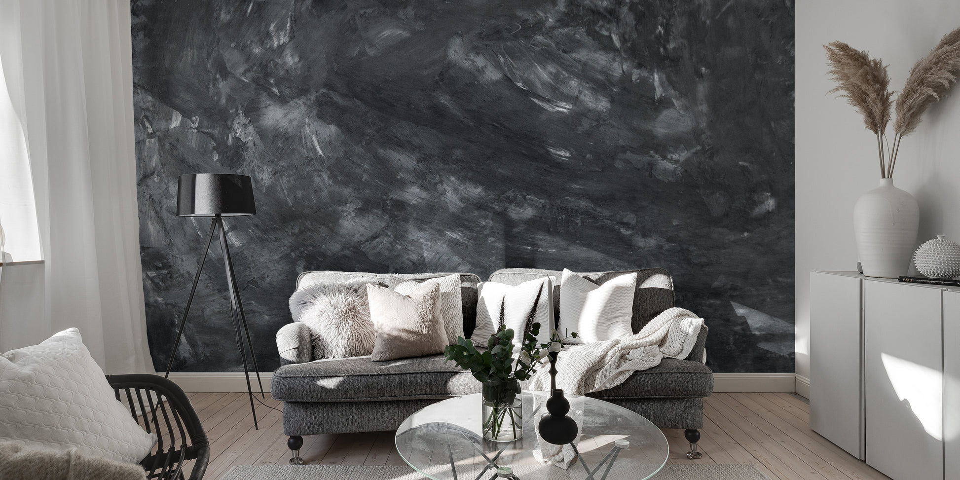 Dark Concrete wallpaper mural styled as a feature wall behind a dining table and chairs in black tones