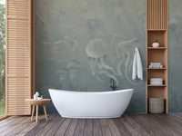 Dark Jellyfish Deep Sea wall mural behind a white freestanding bathtub with wooden slat walls