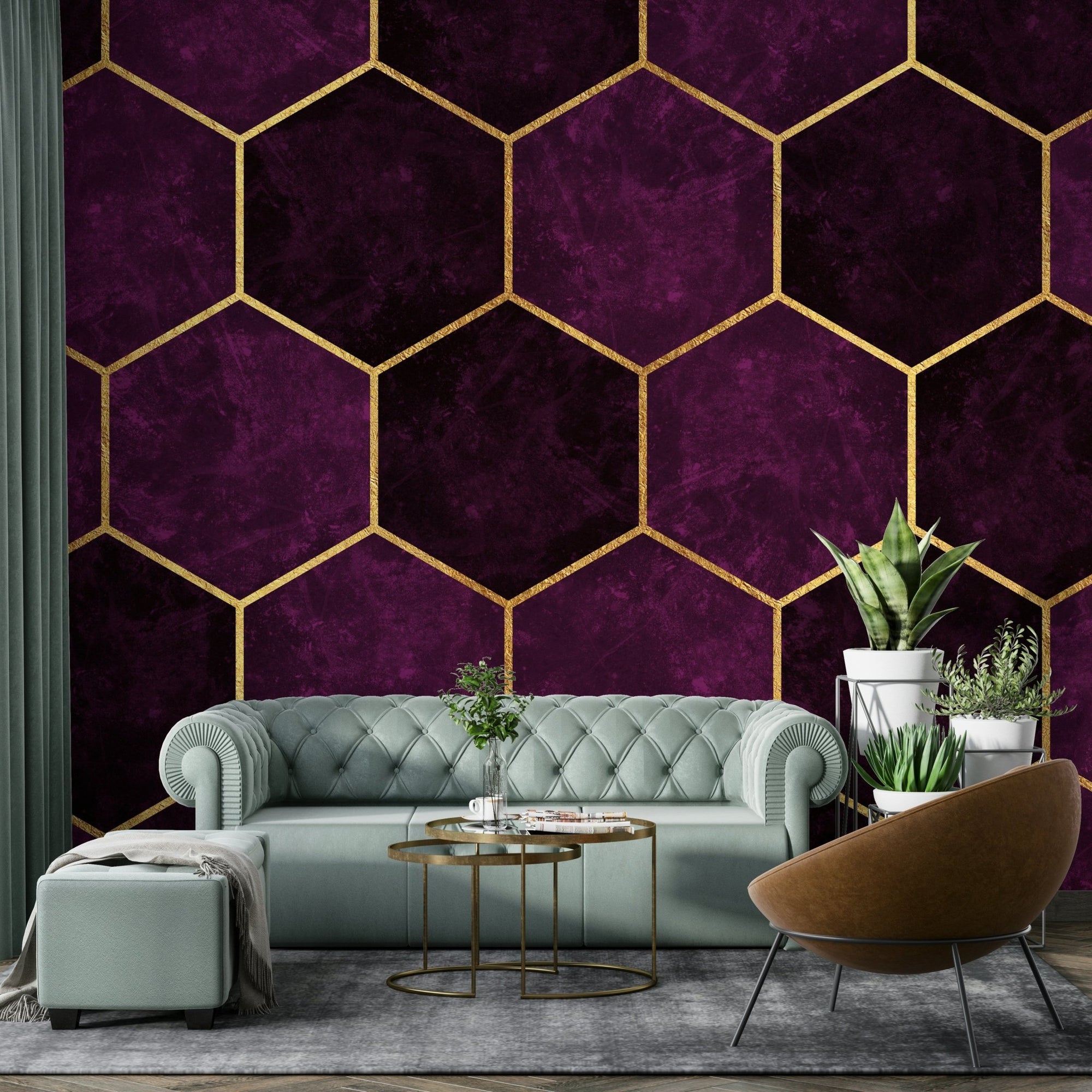 Dark Plum Luxury Pink Hexagons wallpaper mural with gold-outlined hexagons behind a sage green sofa in a living room
