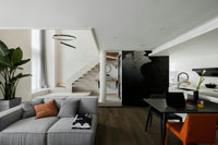 A minimalist home office with the dark river wallpaper.

