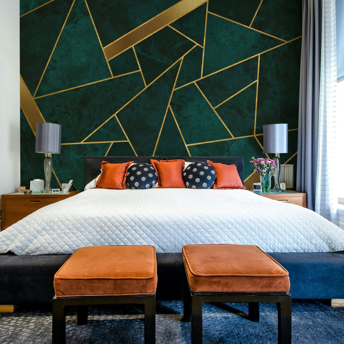 Dark teal and gold mosaic wall mural with abstract shapes

