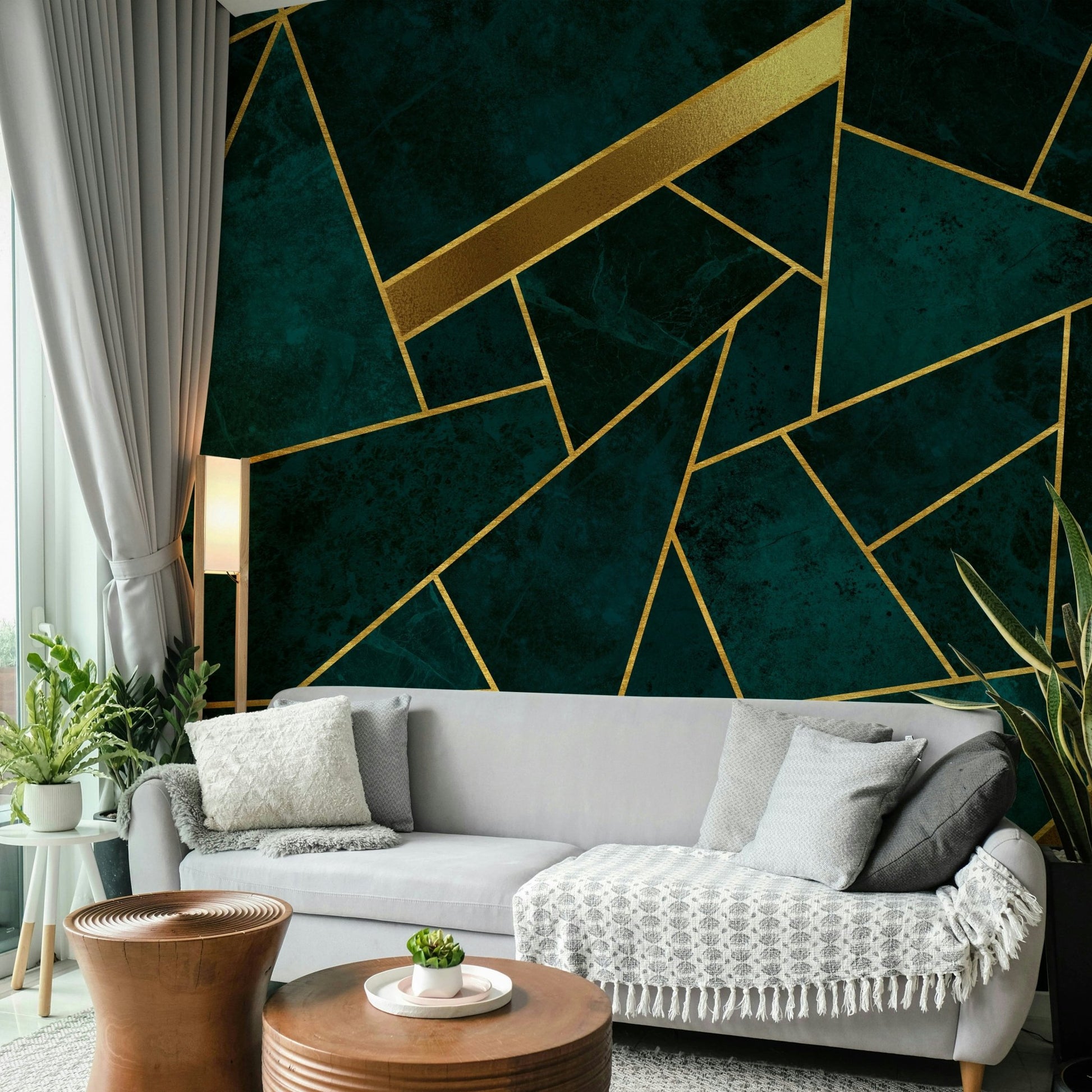 Dark teal abstract mural featuring shimmering gold details

