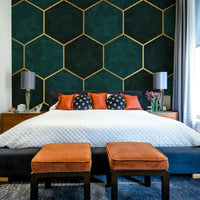 Textured teal mural with bold hexagonal shapes


