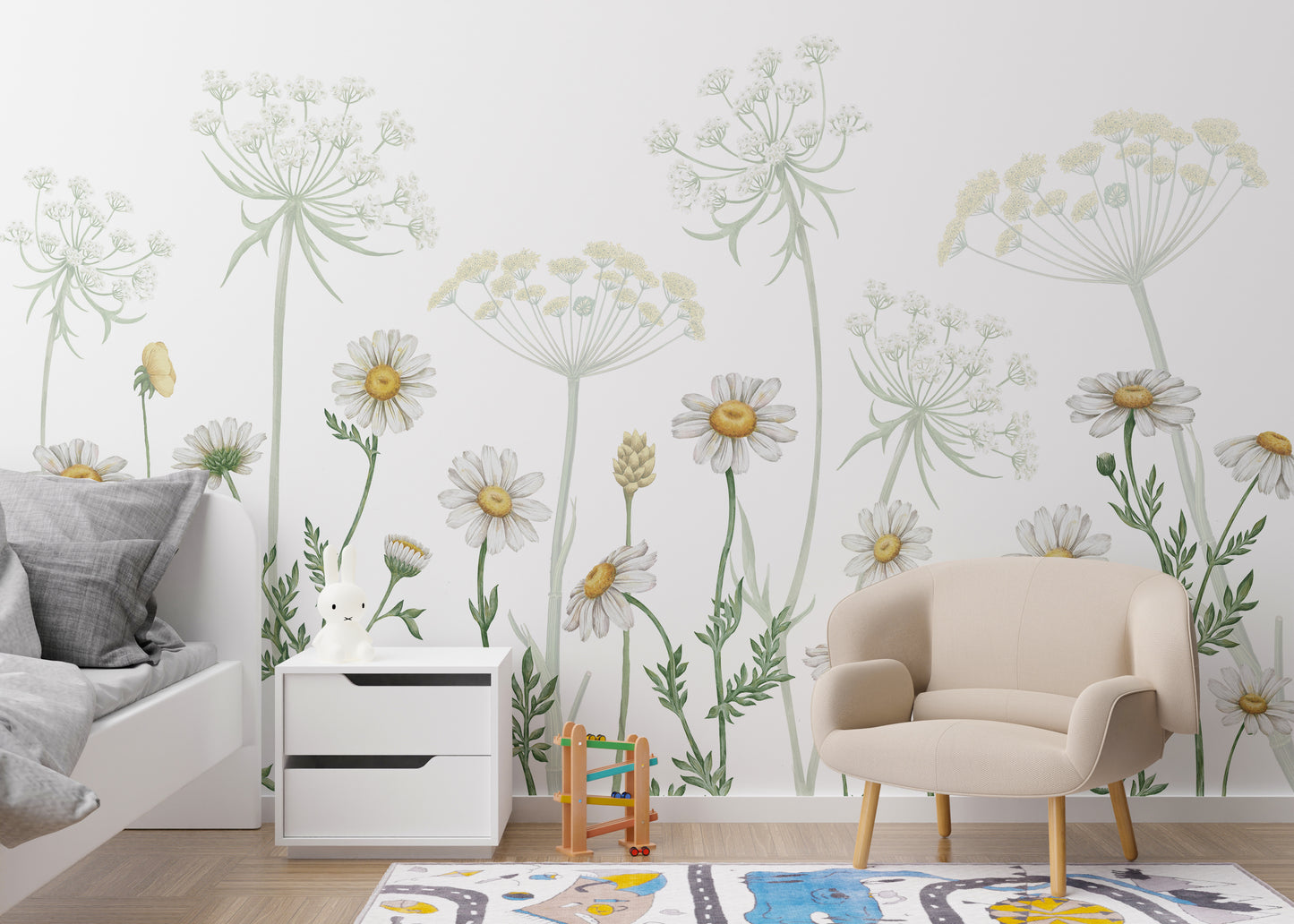 Dazzling Daisies Flower wallpaper of white daisies behind a white bed and beige armchair in a kids room