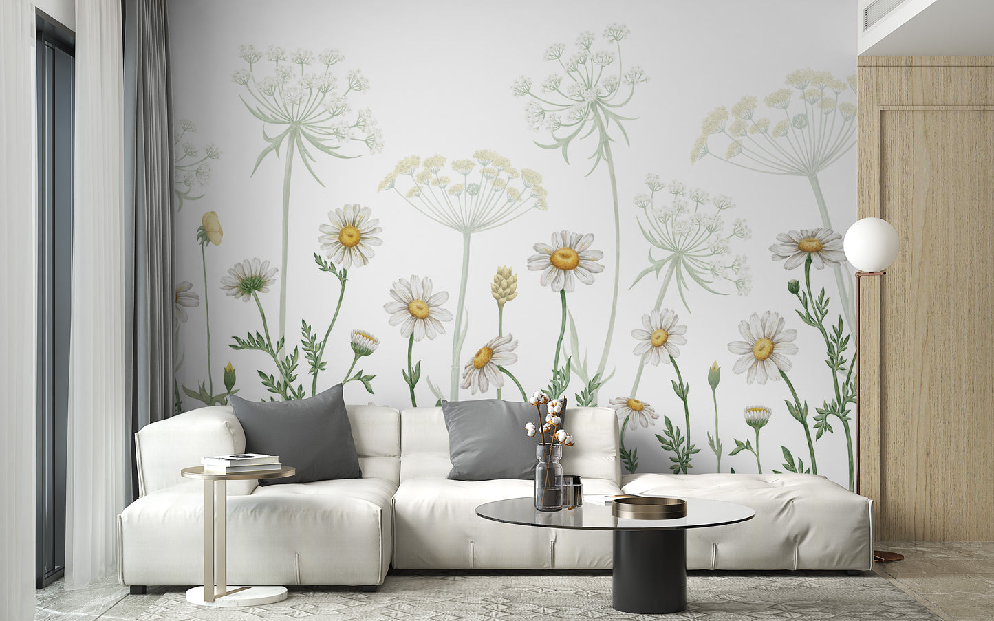 Dazzling Daisies wallpaper of white daisies and wildflowers behind a white sectional sofa in a bright living room