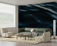 Wall mural with deep blue ocean waves for a peaceful and immersive interior look.