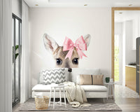 Deer with a bow wall mural capturing nature’s beauty.

