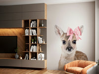 Deer with a bow wall mural for a nature-inspired look.

