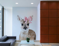 Elegant deer with a bow design in wall mural.

