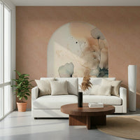 Delicate Bloom Frame wallpaper mural behind a white curved sofa and round walnut coffee table with a fiddle-leaf fig