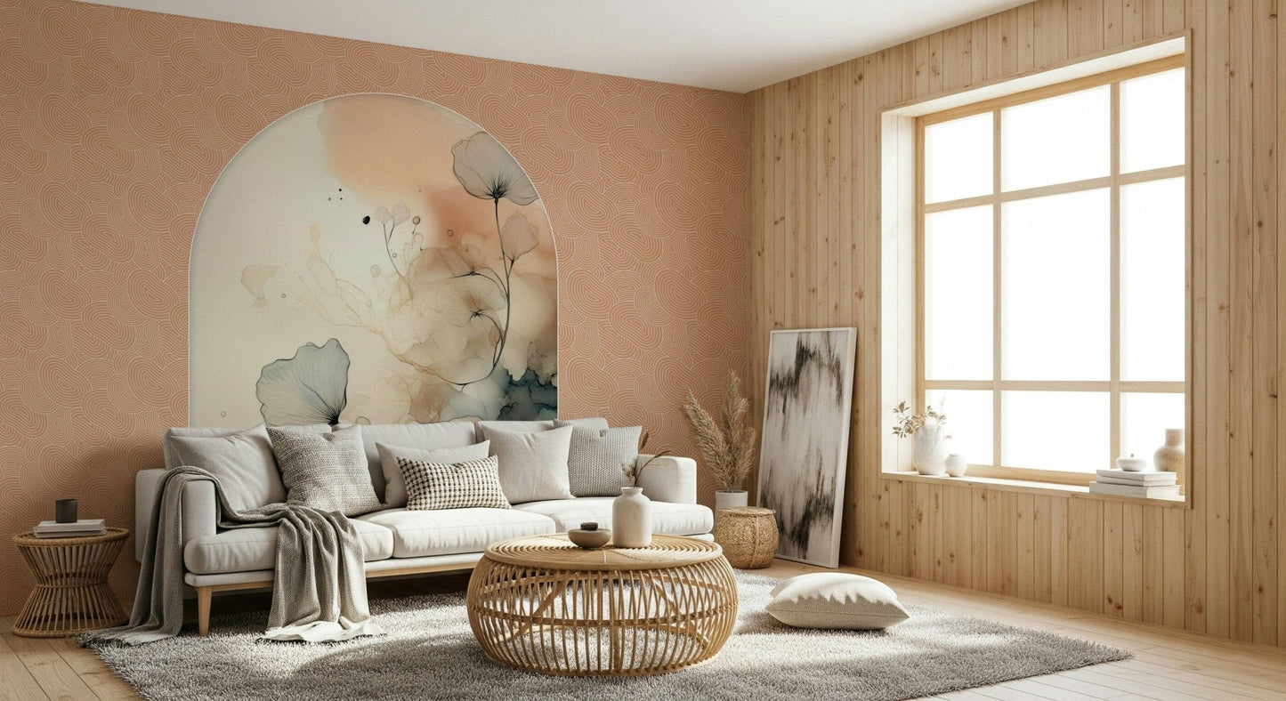 Delicate Bloom Frame wallpaper mural in soft blush and teal behind a white sofa with a rattan coffee table in a living room