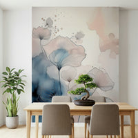 Delicate Floralscape wallpaper mural behind a wooden dining table set with a bonsai tree and potted plants