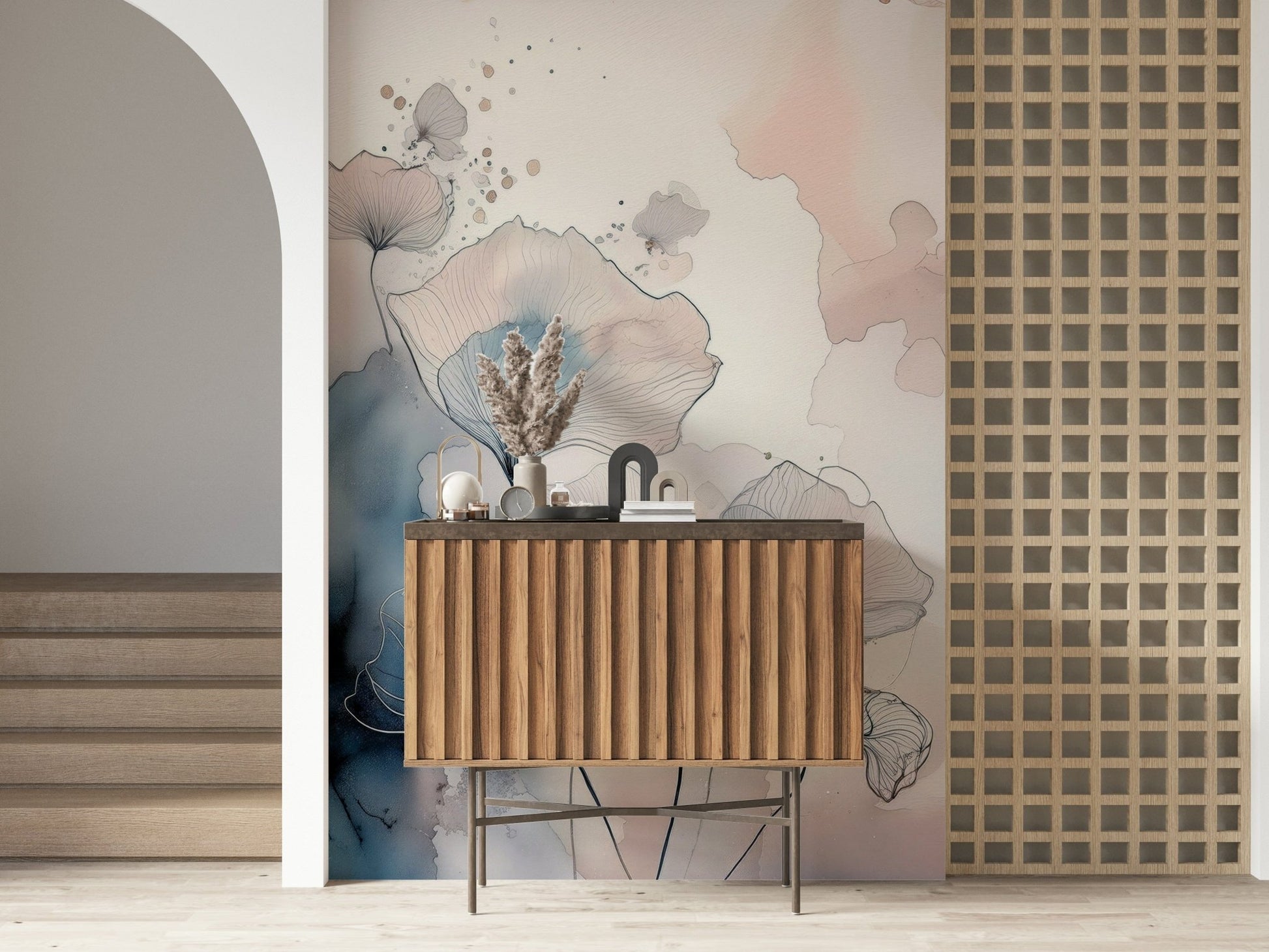 Delicate Floralscape wallpaper mural behind a fluted wood console with pampas grass beside an arched doorway