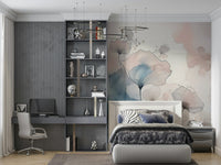 Delicate Floralscape wallpaper mural behind an upholstered bed with zebra bedding and a grey desk and shelving