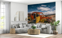 Desert Bicycle Wall Mural – Artistic depiction of vintage wheels resting in a serene desert landscape.