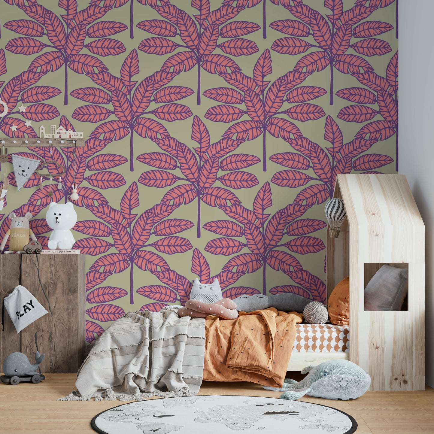 Bold tropical leaves in pink and purple on a warm cream-colored background.

