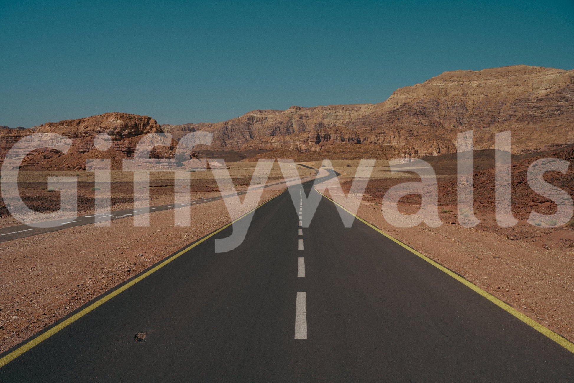 A detail of the warm tones in the desert and sky.

