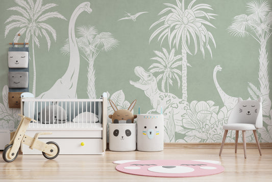 Monochrome Dino Green wallpaper mural with white dinosaurs and palms in a nursery with a white crib and balance bike