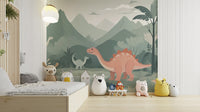 Kids Dinosaur wall Mural on canvas in a nursery with yellow storage bins and soft plushies.