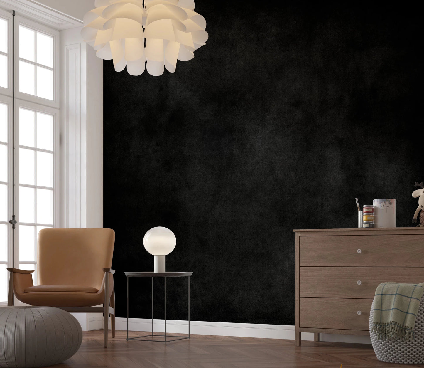 Dirty Paper - Cave wallpaper mural of a textured charcoal wall beside a tan armchair and wood dresser