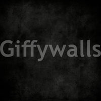 Dirty Paper - Cave wallpaper mural shown as a full-wall charcoal grunge plaster texture in deep black tones
