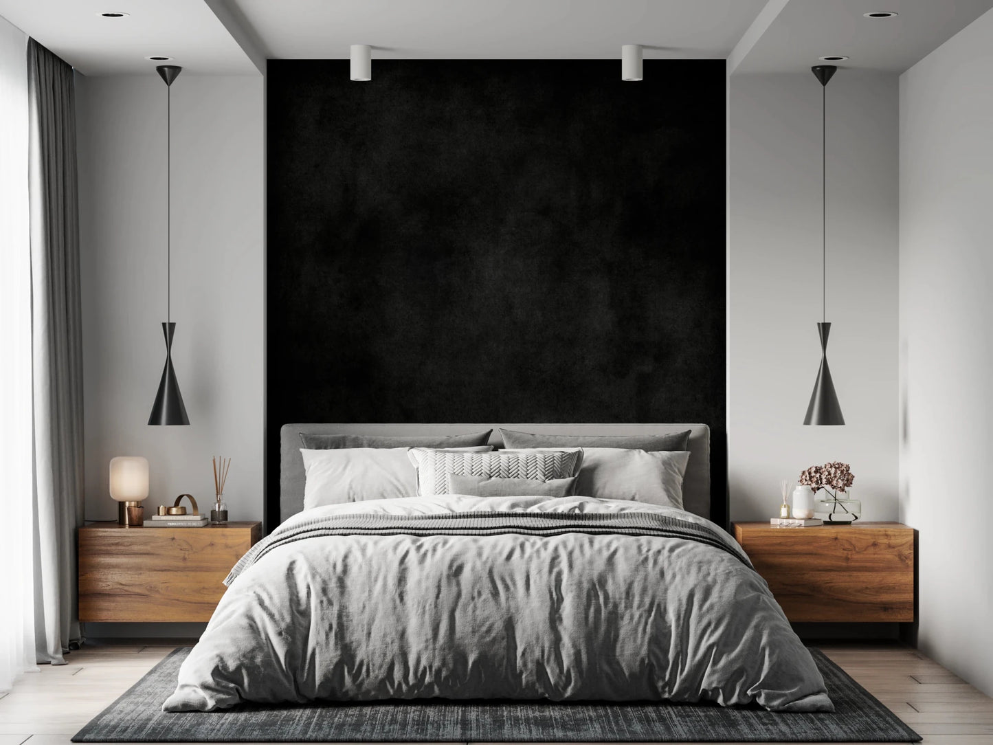 Dirty Paper - Cave wallpaper mural of a black textured wall behind a grey bed flanked by wood nightstands