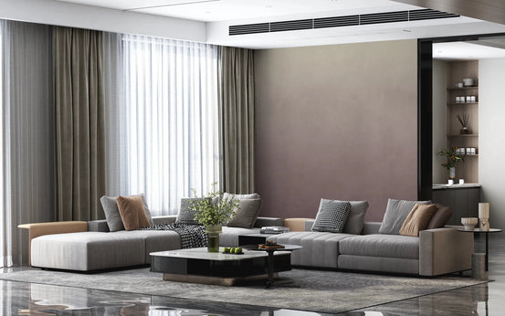 Dirty Paper - Ombre Lilac wallpaper mural fading taupe to mauve behind a grey sectional and marble coffee table