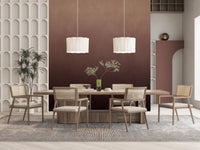 Dirty Paper Ombre Peach wall mural in a dining room with wood table, cane chairs and twin pleated pendant lamps