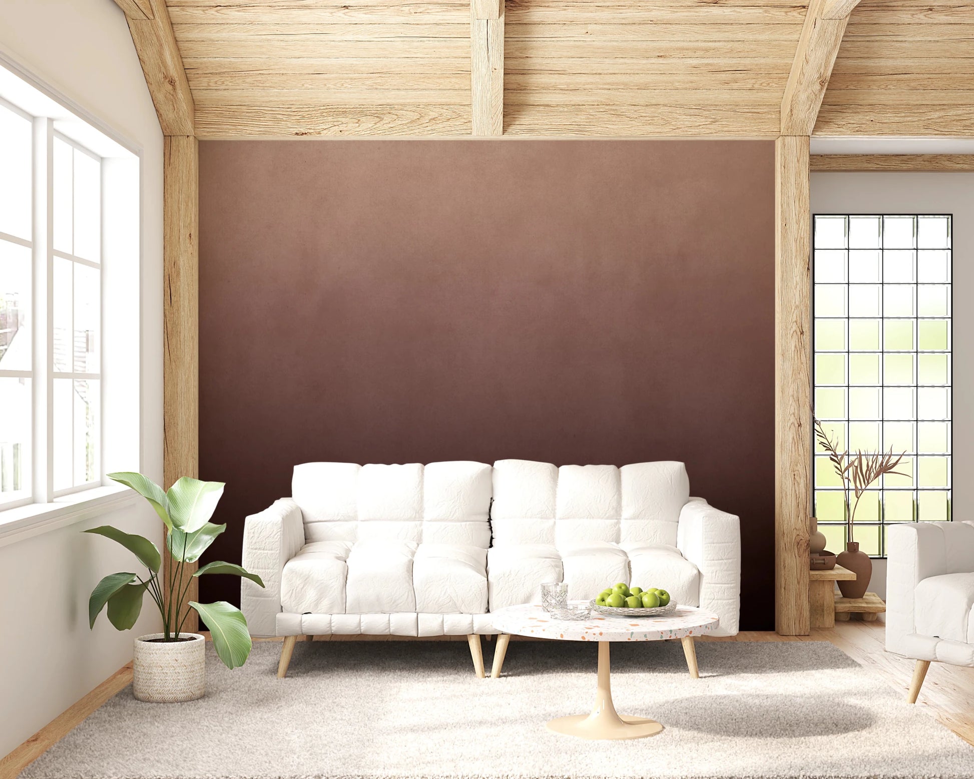 Dirty Paper Ombre Peach wall mural in a rustic living room with white tufted sofa, wood ceiling beams and plant