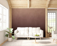 Dirty Paper Ombre Peach wall mural in a rustic living room with white tufted sofa, wood ceiling beams and plant