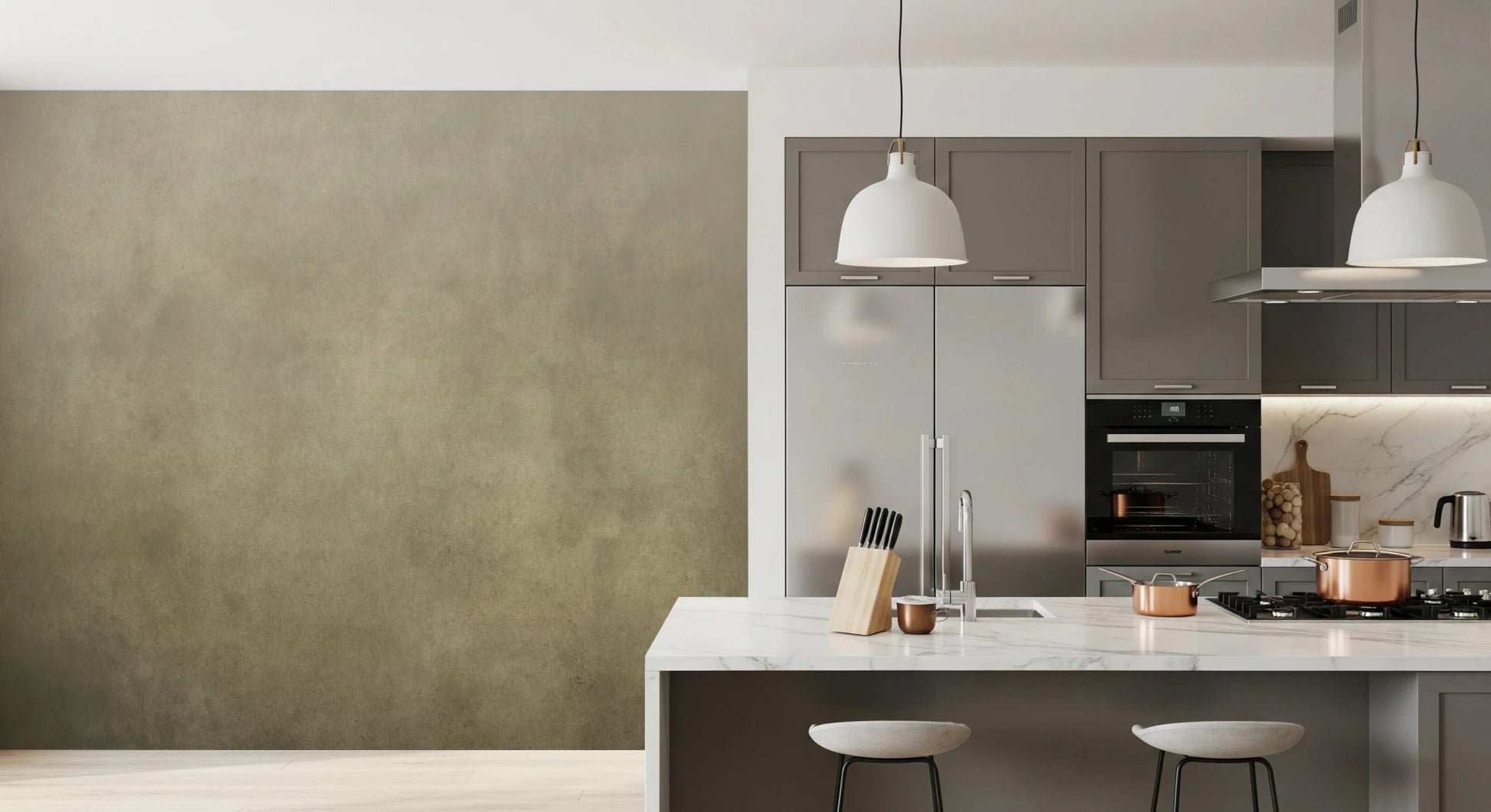 Ombre Tobacco wall mural in a grey kitchen with copper cookware, marble island and white pendant lamps