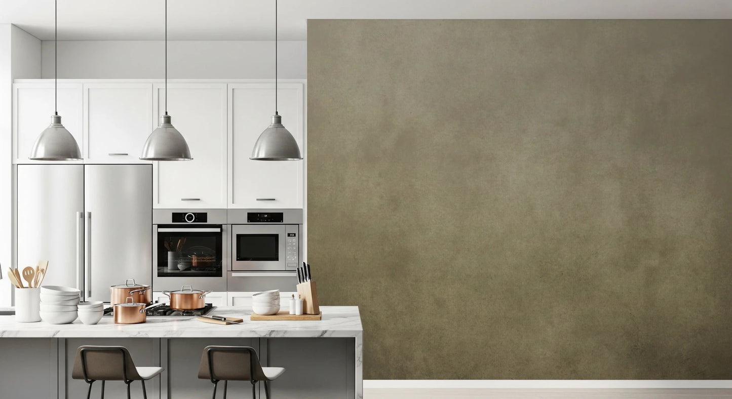 Ombre Tobacco wall mural in a white kitchen with copper pots, marble island and pendant lights