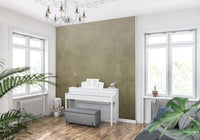 Ombre Tobacco wall mural in a music room with white upright piano, grey bench and chandelier