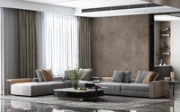 Dirty Paper Taupe wall mural in warm brown behind grey sofas with marble coffee table in a luxe living room
