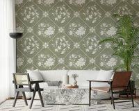 Distressed floral diamond wallpaper behind bed, simple bedroom décor with minimal artwork