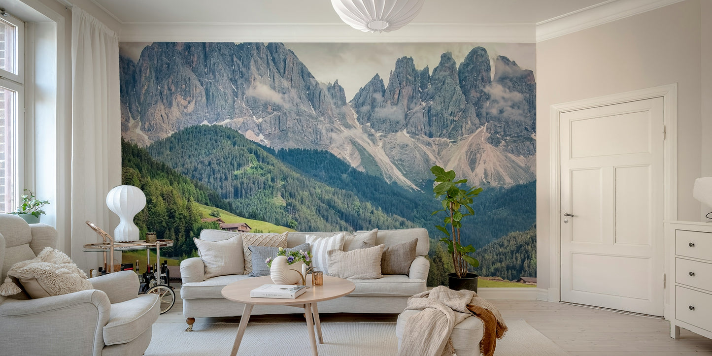 Tranquil mountain wallpaper with misty peaks and light

