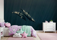Deep Blue Journey wallpaper mural of two dolphins swimming in dark blue water above a unicorn-themed bed in a girl's bedroom