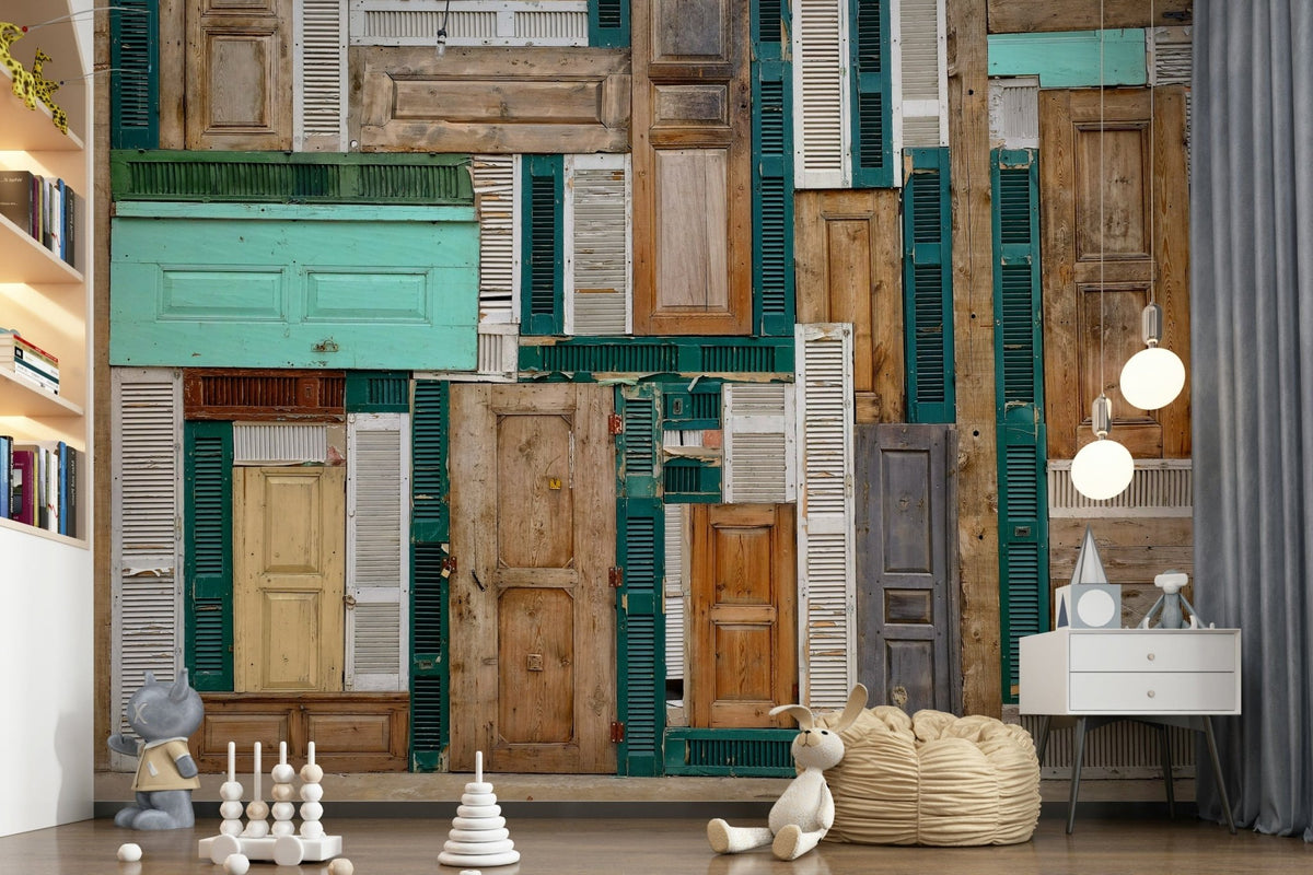 Doorscape Collage wallpaper mural of reclaimed teal and wood doors in a nursery with toys, bean bag and bookshelf