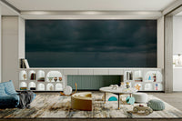 A graceful wave motion wall mural in cool, natural tones.

