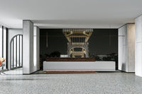 A close-up view of a string of lights on the bridge structure.

