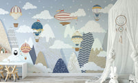 The design features hot air balloons and clouds.

