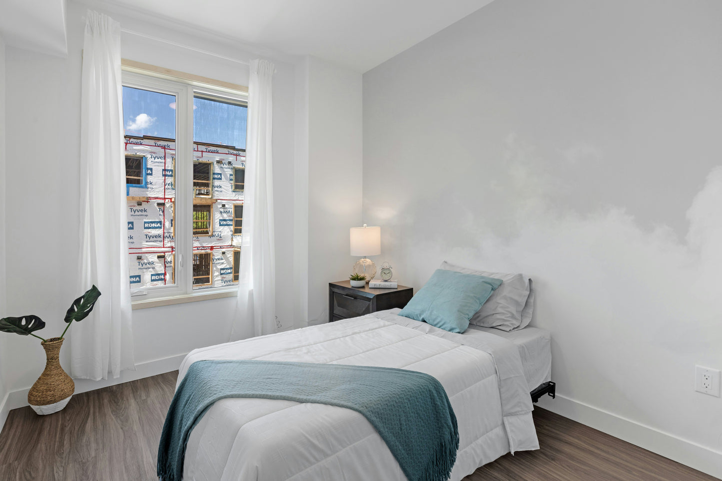 Custom-sized Cloud Dancer wall covering installation in a home office.