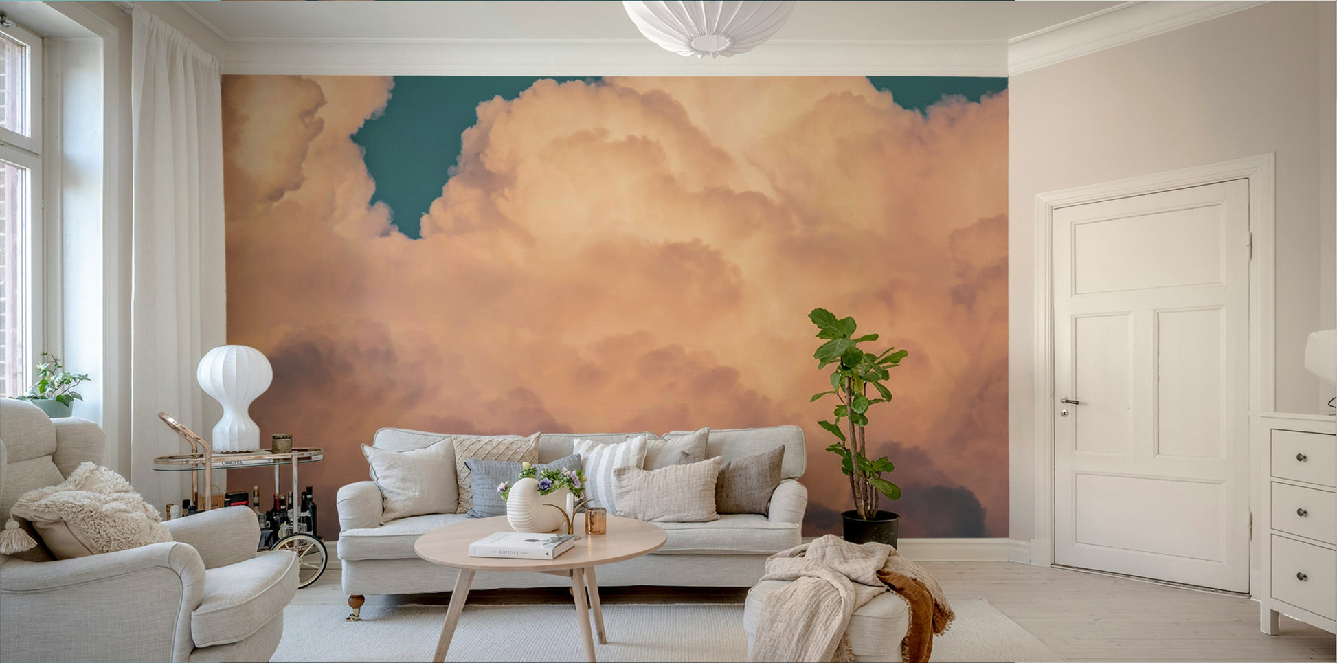 A living room featuring the cloud wall mural.