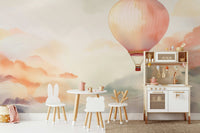 Large scale sky mural in a home with natural light and plants.